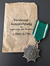 Eastern Peoples medal 2nd Class in silver without swords and paper packet